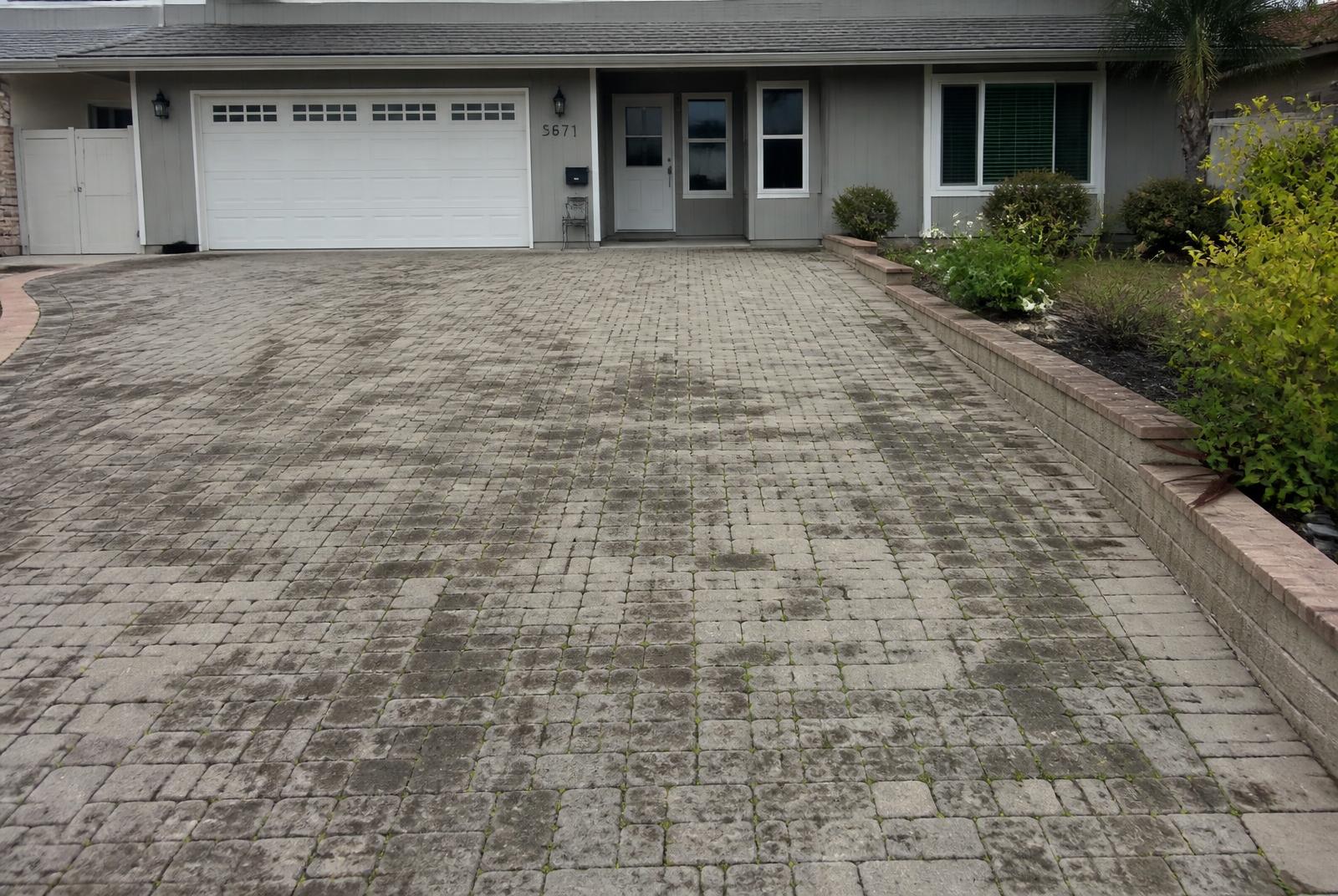 Driveway before pressure washing